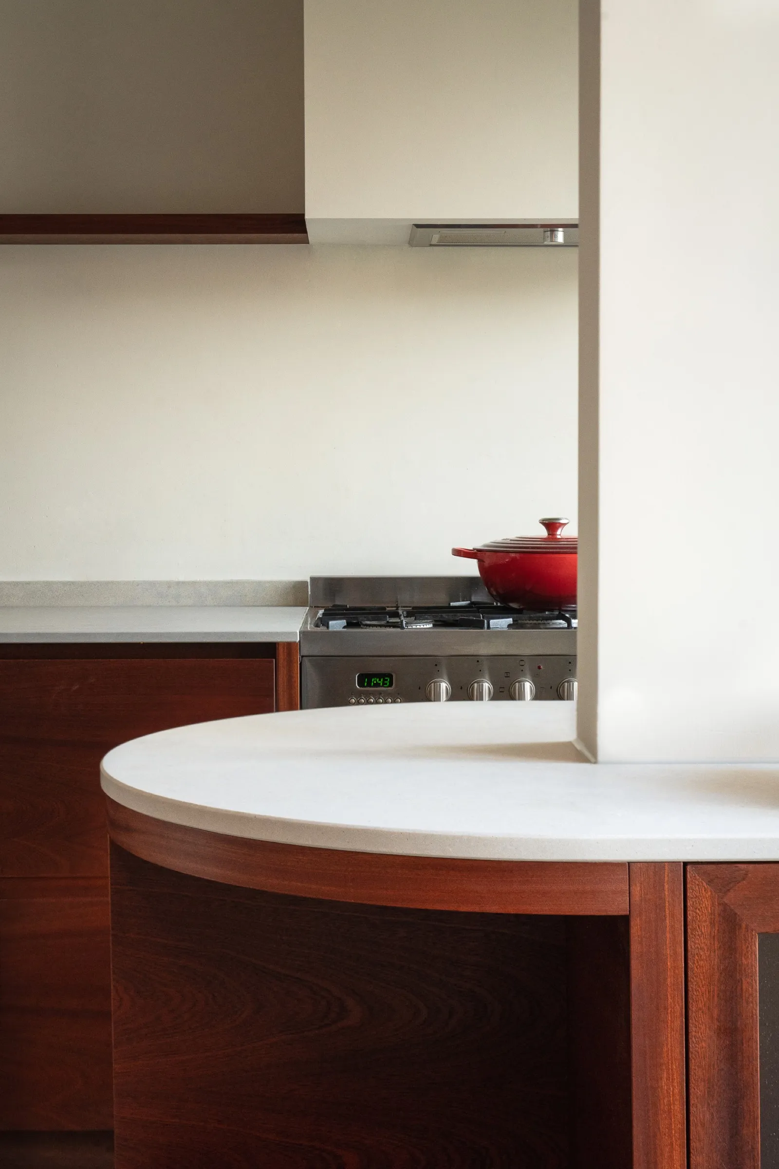 Kitchen island in mahogany with a honed limestone top, canal house, Amsterdam