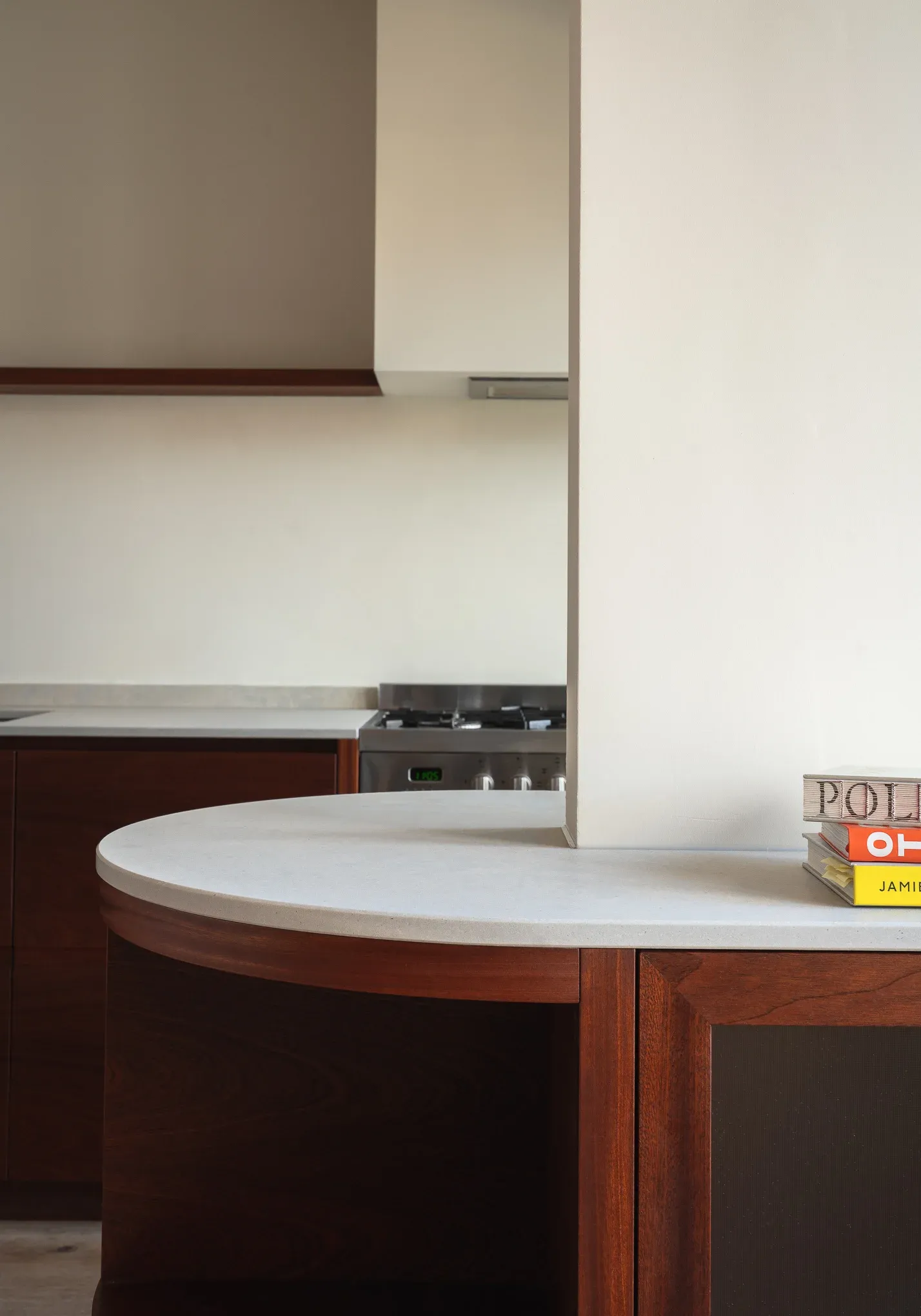 Kitchen island in mahogany with a honed limestone top, canal house, Amsterdam