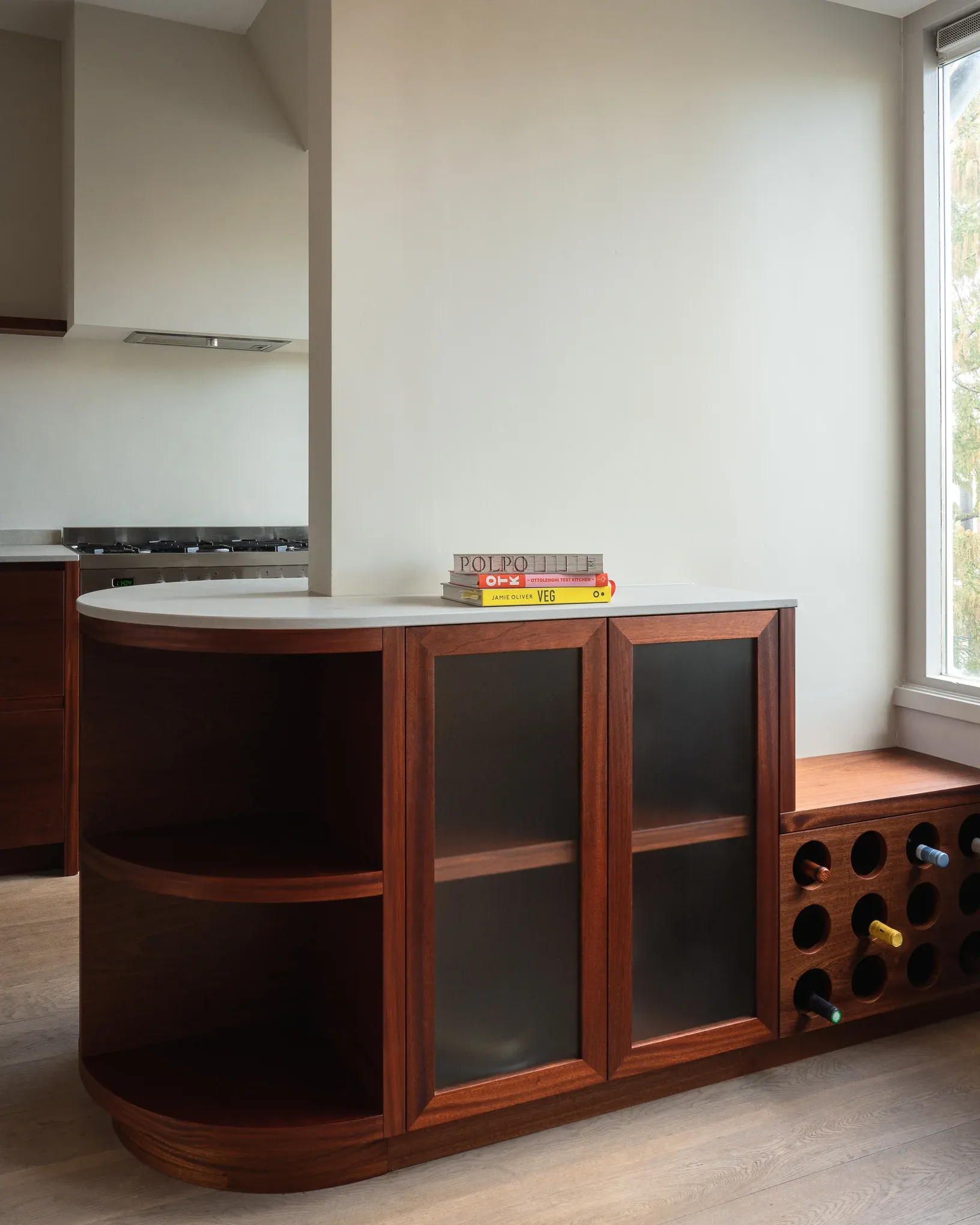 Kitchen island in mahogany with a honed limestone top, canal house, Amsterdam